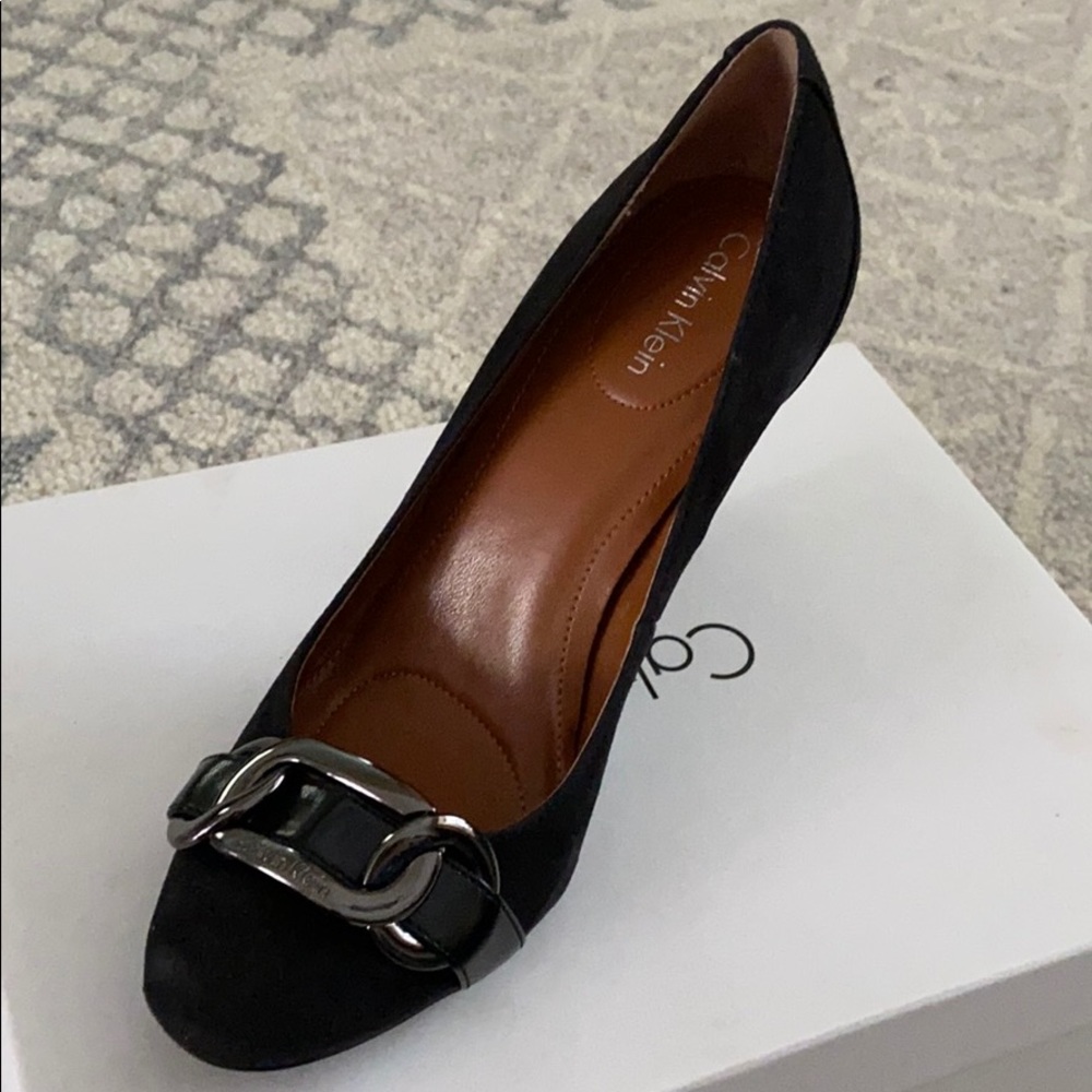 Buy me! Make me an offer! Calvin Klein black heel.